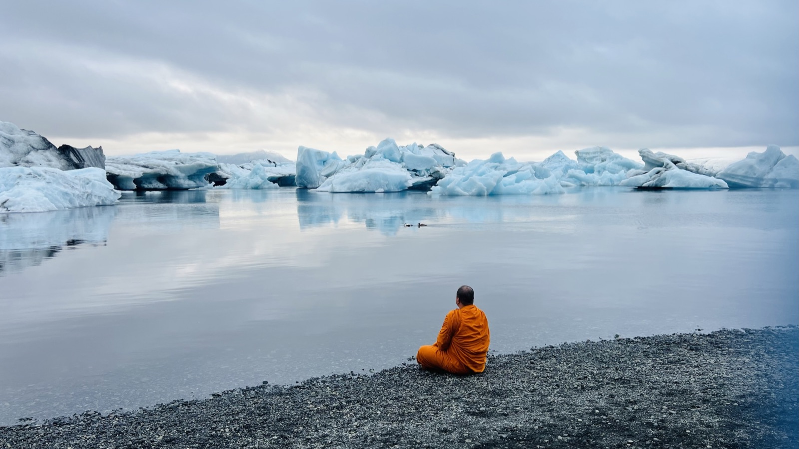 Sitting by icebergs on a trip to Iceland